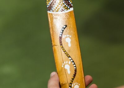 Message stick - a col­lec­tive mes­sage of Cul­tur­al Safe­ty, craft­ed by the group, was then tak­en for­ward and passed on to the wider conference.